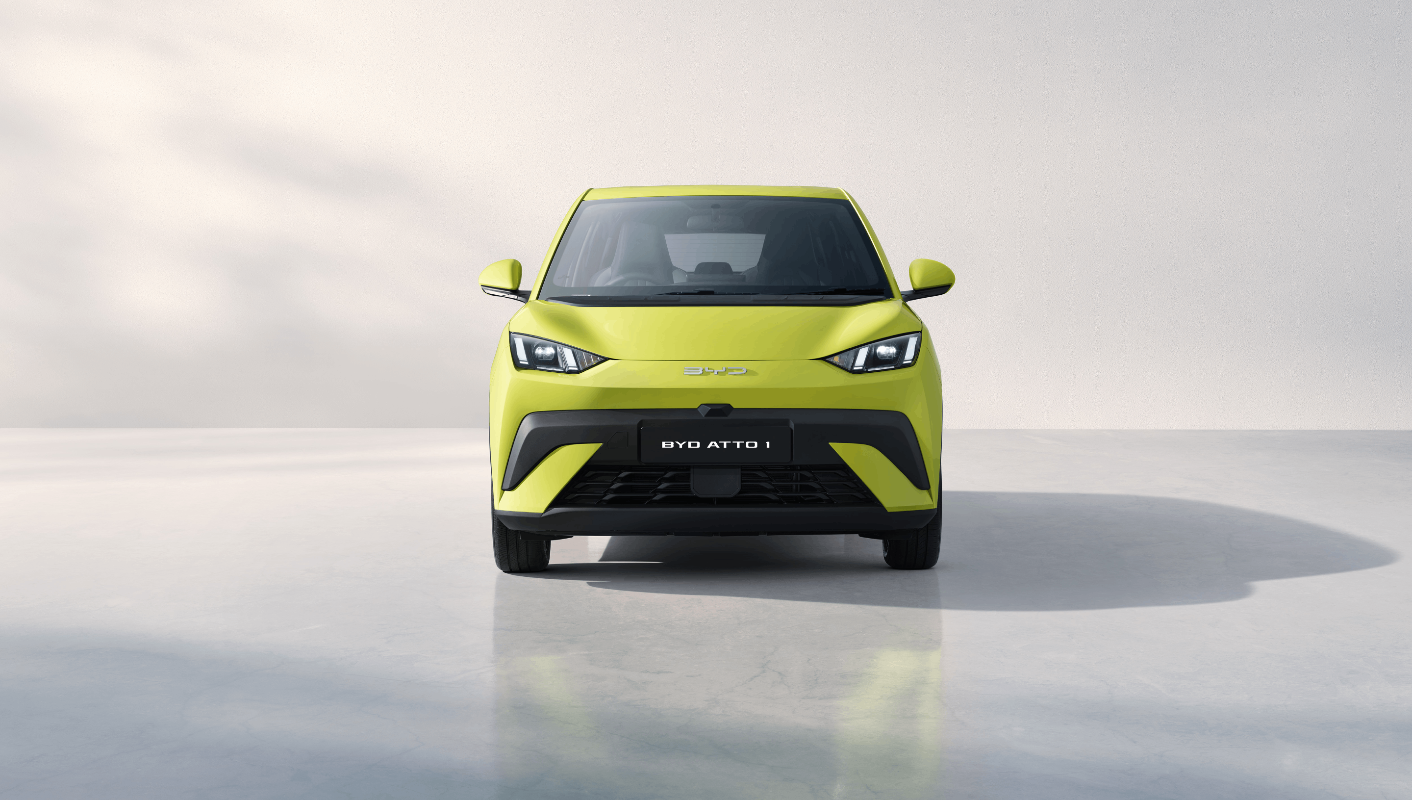 Detail of zipper pull with tan leather and silver rivet.