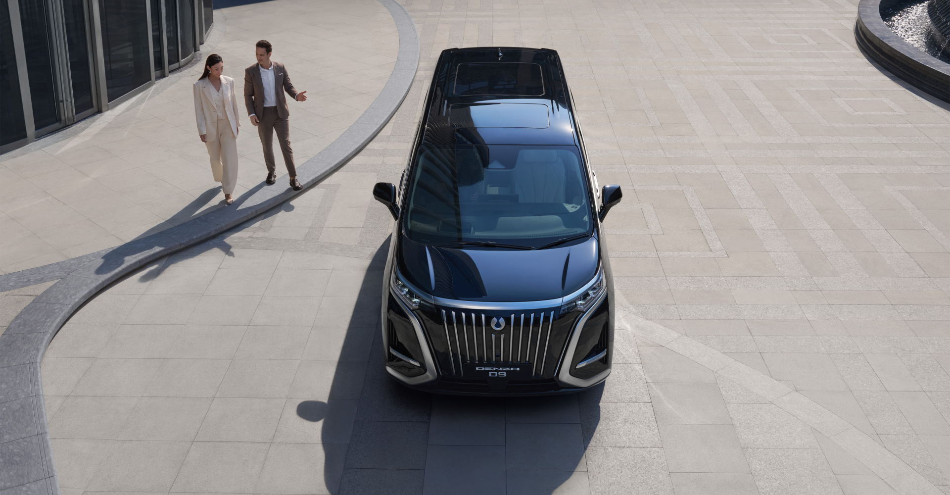 White canvas laptop sleeve with gray felt interior, silver zipper, and tan leather zipper pull.