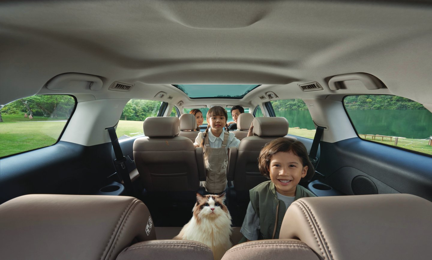 White canvas laptop sleeve with gray felt interior, silver zipper, and tan leather zipper pull.