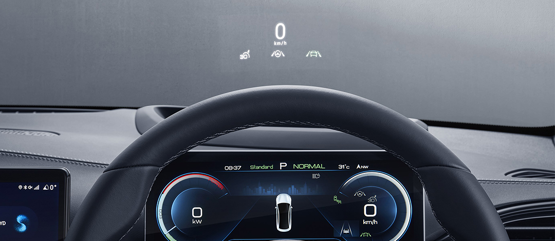 Detail of zipper pull with tan leather and silver rivet.