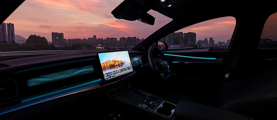 White canvas laptop sleeve with gray felt interior, silver zipper, and tan leather zipper pull.
